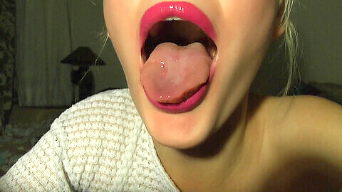 Mila's seductive red lips and tantalizing long tongue